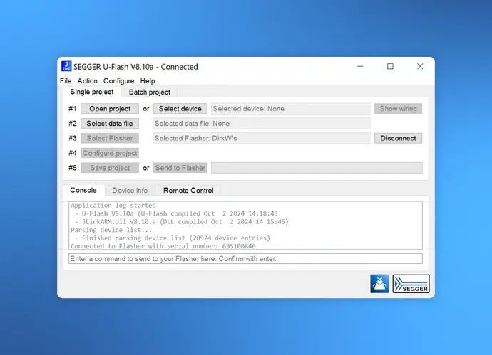 A computer interface for SEGGER U-Flash V8.10a, showing options for managing projects, selecting devices, and configuring settings. The console displays an application log with status updates, including connection details and device information. The background is a gradient blue.