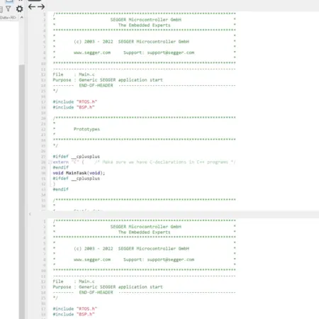 The image displays a code snippet from a C programming file for a SEGGER embedded application. It includes comments, header information, and function prototypes for RTOS and BSP integration. Key features include references to extern "C" for C++ compatibility and a main task function declaration.