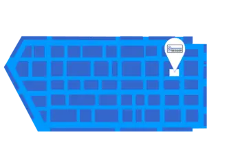 A simplified map layout in blue shades, depicting a street grid with a marked location for "SEGGER." The highlighted spot indicates the company's position on the grid, helping with navigation.