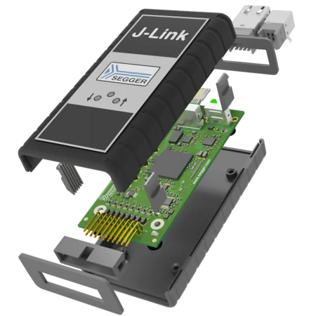 An exploded view of a J-Link Pro debug probe, showcasing its main components: a circuit board with electronic components, a plastic casing, and additional parts. The design exhibits the internal structure and layout, emphasizing the probe's purpose in programming and debugging electronic devices.