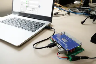 Direct connection via USB Flasher Hub-4 connected to laptop via USB cable