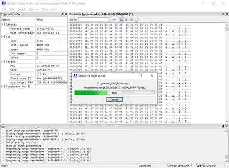 A software interface displays information related to programming a microcontroller (STM32F407VE) using SEGGER J-Flash. A progress bar indicates that programming is 41% complete, with details about target memory and settings visible in adjacent sections.
