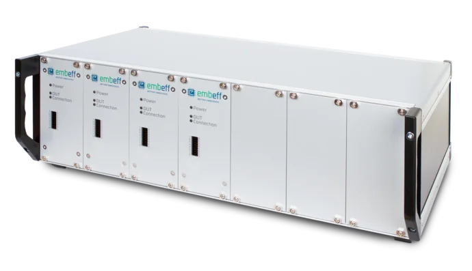 A rectangular electronic device with multiple slots on the front for connections. It features labels indicating "Power" and "DUT Connection." The device has a sleek metallic finish and is designed for embedded systems.