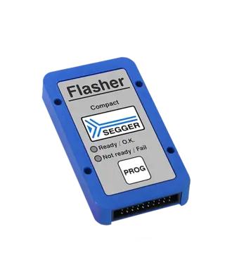 A compact blue device labeled "Flasher" is displayed. It features a gray panel with the SEGGER logo and indicators showing "Ready / O.K." and "Not ready / Fail." There is also a button labeled "PROG" on the device.