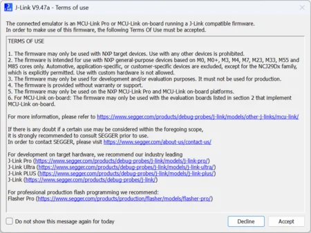 A terms of use agreement for a J-Link emulator, specifying that the firmware is for NXP target devices only, intended for development and evaluation. Users must accept these terms to proceed, with options to decline or not show the message again.