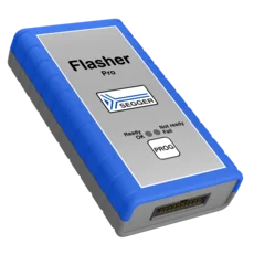 A SEGGER Flasher PRO device, used for in-circuit programming, features a grey body with blue accents. The top has the word "Flasher" and the SEGGER logo, along with status indicators labeled "Ready," "Not ready," and "Fail," plus a "PROG" button.