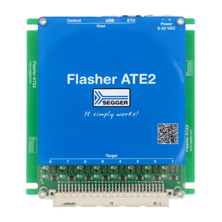 A blue electronic device labeled "Flasher ATE2" is shown with connectors and ports on one side. The device has the tagline "It simply works!" printed on it and features a QR code. Various input/output connections are visible along the bottom edge.