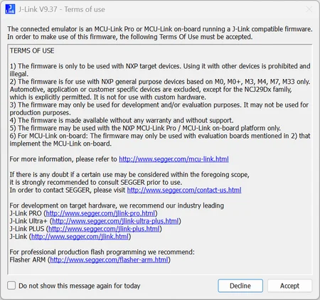 A terms of use agreement for a J-Link emulator, specifying that the firmware is for NXP target devices only, intended for development and evaluation. Users must accept these terms to proceed, with options to decline or not show the message again.