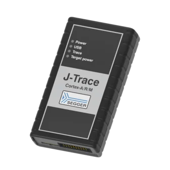 Alt text: A black device labeled "J-Trace Cortex-A/R/M" with indicator dots for Power, USB, Trace, and Target power. The device features a textured surface and comes from the brand Segger. It has connection ports on one end.