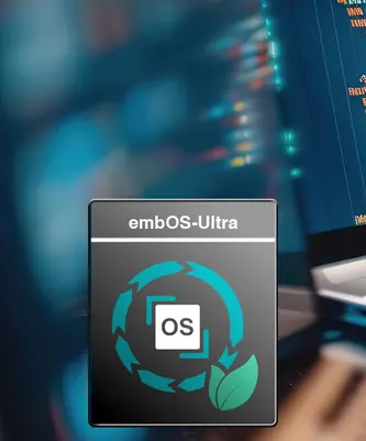 The image features the logo for "embOS-Ultra," highlighting its emphasis on operating system functionality with a circular design and a leaf symbol, suggesting sustainability. In the background, blurred programming code is displayed on a computer screen, indicating a tech-focused environment.