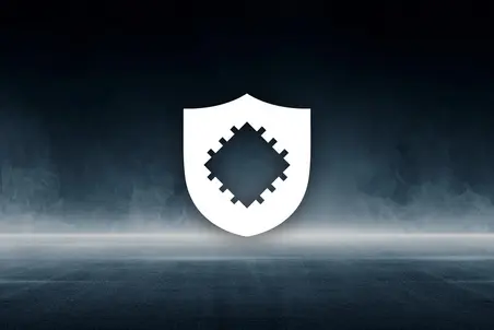 A minimalistic white shield icon is centered in the image. The shield features a pixelated, diamond-shaped pattern in the middle, set against a dark, smoky background. The design conveys themes of protection and digital security.