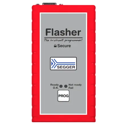 An in-circuit programmer device labeled "Flasher" with a gray face and red casing. It features the SEGGER logo, status indicators for "Ready," "Not ready," and "Fail," along with a "PROG" button, highlighting its function for programming tasks.