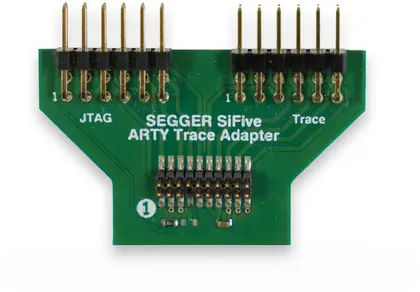 Image of a green printed circuit board (PCB) labeled "SEGGER SiFive ARTY Trace Adapter." The board features multiple pin headers, with the labels "JTAG" and "Trace" positioned near the top. The design includes clear traces and solder connections typical for electronic components.