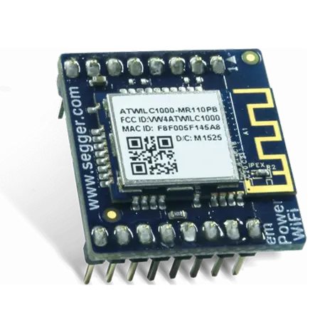 This image shows a compact blue circuit board featuring an ATWML C1000-MR410PB wireless module. It includes pins for connections and a QR code in the center, which provides information about the module's specifications and identification.