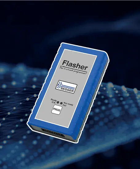 A blue and gray in-circuit programmer labeled "Flasher" is displayed. It features a logo for SEGGER and indicators for "Ready," "Not ready," and "Fail" status. The device is used for programming electronic circuits. The background has a digital design.