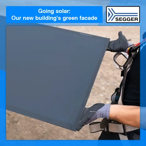 News graphic: Going solar: our new building's sustainable facade News graphic: Solar panel being held by construction worker