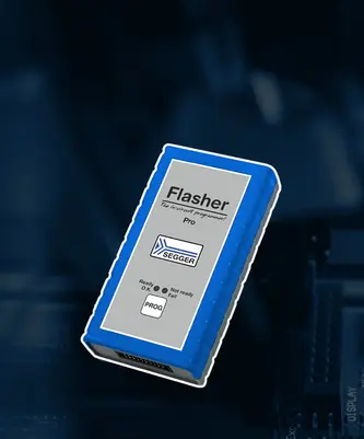 A blue rectangular programming device labeled "Flasher Pro" with the SEGGER logo. The front features indicators for "Ready," "Not ready," and "Fail," along with a "PROG" button. This device is used for embedded programming.