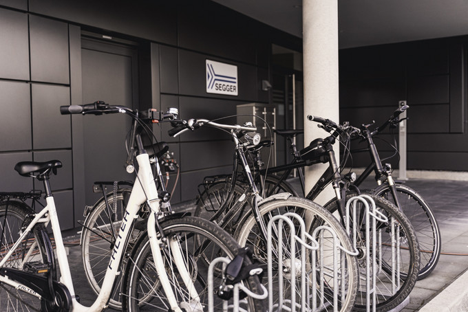Job bikes in racks in the entrance area of the office building