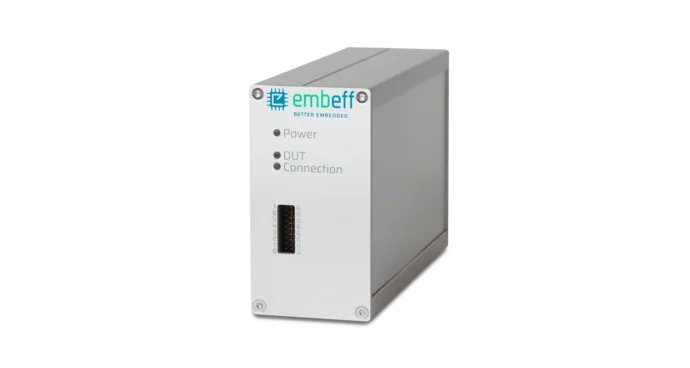 A silver electronic device with indicators for power, DUT (Device Under Test), and connection. It features a logo that reads "embeff" and has a vertical slot at the front, suggesting its function in embedded systems or electronic testing applications.