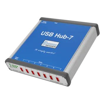The image features a Segger USB Hub-7 device with a blue top surface, displaying the text "USB Hub-7" and "It simply works!" It has multiple USB ports on one side for device connections, along with indicator lights for power and status.