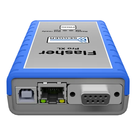 The image shows a gray device labeled "Falsketer Pro X1" with a blue rubber edge. It features ports on one side: one USB port, one network port with lights, and a serial port. The design is compact and intended for electronic use.