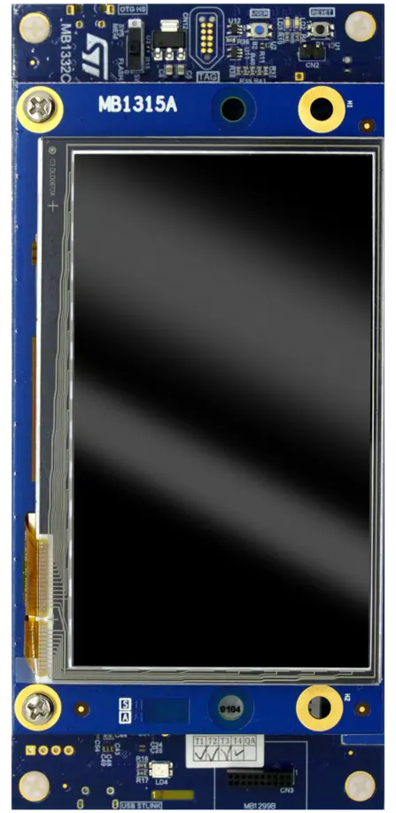A rectangular electronic display module with a black screen and blue printed circuit board. Various connectors and components are visible, including labels such as "MB1315A" and "USB STLINK." The module features a standard layout for integration into electronic devices.